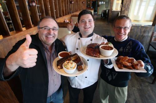 L to R  Dannys Whole Hog BBQ on Ellice Ave and Route 90  Danny Kleinsasser-owner,  Executive chef Hary Haidai, and Manager Ty Wells  show selection of food available in their restaurant-See Marion Warhaft food review- November 27, 2012   (JOE BRYKSA / WINNIPEG FREE PRESS)