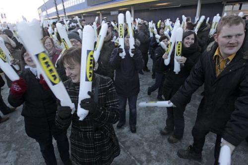 IKEA employees use thunder sticks to get the crowd going minutes before the opening. 121128 - Wednesday, November 28, 2012 -  (MIKE DEAL / WINNIPEG FREE PRESS)