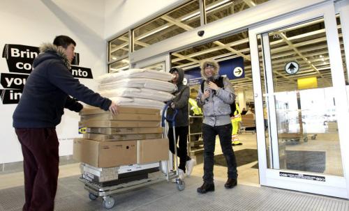 Happy customers make their way towards the exit after the grand opening of Winnipeg's IKEA Wednesday morning. 121128 - Wednesday, November 28, 2012 -  (MIKE DEAL / WINNIPEG FREE PRESS)
