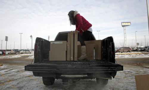 Terri Seguin from Sioux Lookout, Northwestern Ontario, loads up her truck after the grand opening of Winnipeg's IKEA Wednesday morning. 121128 - Wednesday, November 28, 2012 -  (MIKE DEAL / WINNIPEG FREE PRESS)