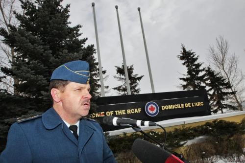 Major-General Poerre St-Amand, Commander 1 Canadian Air Division during the sign dedication and the raising of flags at the entrance/exit to the airport on Wellington Avenue Thursday afternoon.  Staff from the Winnipeg Airports Authority and members from the Royal Canadian Air Force take part in a sign dedication and the raising of flags at the entrance/exit to the airport on Wellington Avenue Thursday afternoon.  121129 November 29, 2012 Mike Deal / Winnipeg Free Press