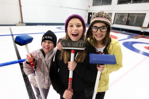 Ten year old Samantha Holyk learns how to curl with her classmates from Balmoral School. Group shot  - Samantha Holyk (centre) with Saige Munroe and Amanda Rear (glasses). See Nick Martin's Story. Nov  28, 2012, Ruth Bonneville  (Ruth Bonneville /  Winnipeg Free Press)