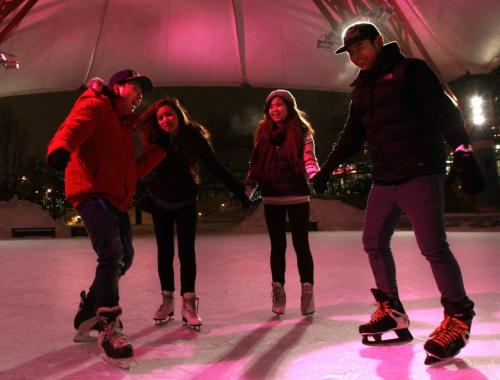From left, Michael Natividad, Ria San Andres, Joanne Cutaran and Carl Saballa enjoy the mild temperature skating on the rink at The Forks Friday evening.  (WAYNE GLOWACKI/WINNIPEG FREE PRESS) Winnipeg Free Press  Nov. 30   201