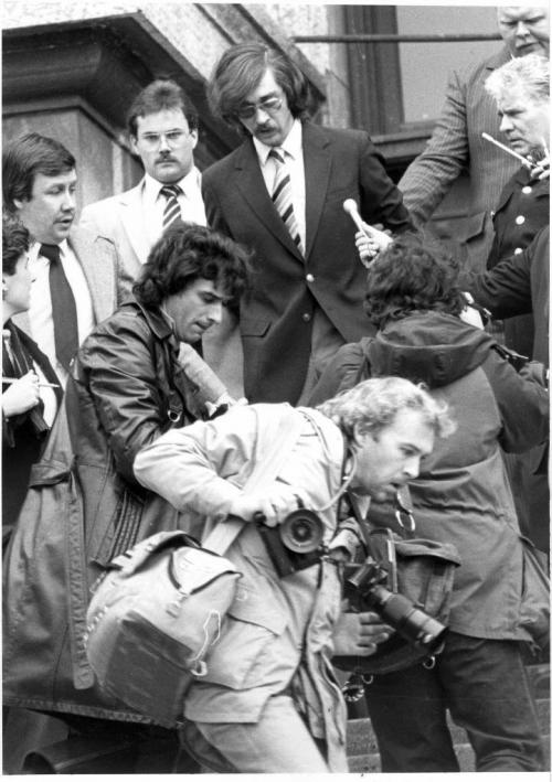 Thomas Sophonow convicted march 17, 1983, in pic shows Sophonow being taken down the steps of the Courthouse , surrounded by media . He faced three trials for the 1981 murder of Barbara Stoppel, he was later acquiited  in 1985. ( WINNIPEG FREE PRESS 140th  ANNIVERSSARY EDITION ) kg140 staff memory  ken gigliotti in photo lower centre left - Photo by James Haggarty Winnipeg Free Press Mar.. 17 1983