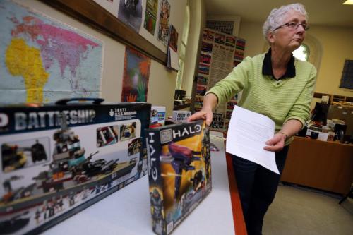 Dianne Cooper from Project Peacemakers displays violent and non-violent toys at Westminster United Church, Saturday, December 1, 2012. (TREVOR HAGAN/WINNIPEG FREE PRESS) geoff kirbyson story