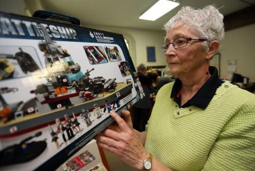 Dianne Cooper from Project Peacemakers displays violent and non-violent toys at Westminster United Church, Saturday, December 1, 2012. (TREVOR HAGAN/WINNIPEG FREE PRESS) geoff kirbyson story