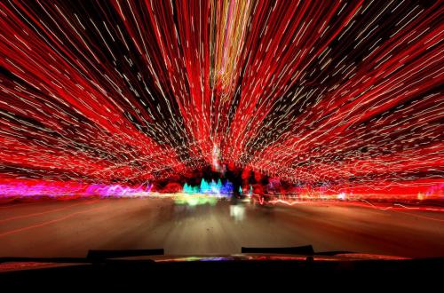 Streams of red and white lines make an abstract image by the use of a  long exposure on the scene while driving through the red canopy which is part of the 13th annual Canad Inns Winter Wonderland display which opened Dec 1 for the Christmas season.  Standup photo   Dec 01, 2012, Ruth Bonneville  (Ruth Bonneville /  Winnipeg Free Press)