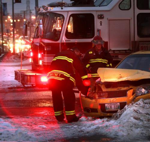 A woman was sent to the hospital after a collision on Provencher Boulevard at Rue La Fleche that slowed rush hour traffic Monday morning. (WAYNE GLOWACKI/WINNIPEG FREE PRESS) Winnipeg Free Press  Dec.3   2012