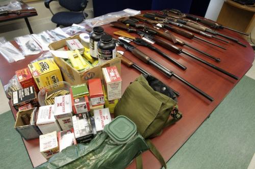 Selkirk RCMP display a number of firearms and other weapons, including knives, bear spray and amunition that were collected during an investigation that is in its twelfth week the police have dubed Project Deduct. 121203 - Monday, December 03, 2012 -  (MIKE DEAL / WINNIPEG FREE PRESS)