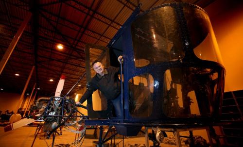 Dale George poses in the "gondola" of an airship he's putting together in a Transcona Warehouse. George is Barry Prentices partner in efforts to build airships that will provide cargo lift to the north. He just received a prestigious award from Ontario Premier recognizing accomplishments of community college grads. See Martin Cash's story. December 4, 2012 - (Phil Hossack / Winnipeg Free Press)