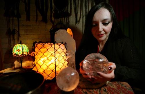 Tanya Parks, owner of Distant Caravans, boutique at the Forks that does Tarot readings and crystal ball readings cradles her crystal ball.....She spoke to Gabe about the Mayan Apocalypse. See her story. December 4, 2012 - (Phil Hossack / Winnipeg Free Press)