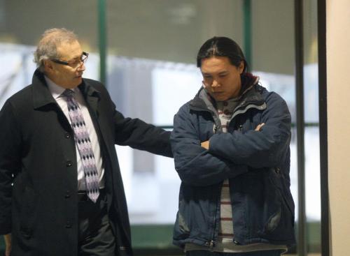 Father Steve Sinclair of  the late Phoenix Sinclair is briefed by lawyer Jeff Gindin before he enters the Phoenix Sinclair inquiry. He was to testify for the first time this morning at the Winnipeg Convention Centre. Today will be his first time he has had a chance to respond about how the social workers handled him and his daughters case. - See Carol Sanders and Lindor Reynolds story and column- December 05, 2012   (JOE BRYKSA / WINNIPEG FREE PRESS)