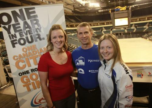 Curlers Jeff Stoughton with left Chelsea Carey and Ashley Howard at the news conference for the up coming 2013 Tim Hortons Roar Of The Rings Dec.1-8 in the MTS Centre. The Rocks in Your Socks ticket promotion featuring a pair of tickets to one of the first two draws priced at $39 will go on sale Dec. 6 at 10:00am. was announced.  The Winnipeg team led by Jeff Stoughton has already earned a berth.  Paul Wiecek story  (WAYNE GLOWACKI/WINNIPEG FREE PRESS) Winnipeg Free Press  Dec.5   2012