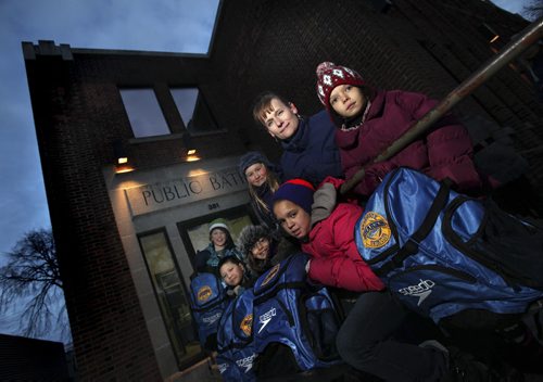 Karla Dueck Thiessen poses with members of the Sherbrook Sharks Swim Club who are lookng for other places to swim and ways to get there after the Sherbrook clossed its doors this week. December 5, 2012 - Phil Hossack / Winnipeg Free Press