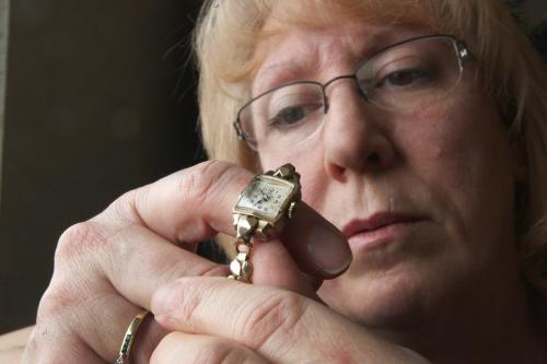 Sherry Winterburn holds a watch that was given to her that belonged to her great-aunt Edith Smallpiece who was believed to have been murdered on Feb 23, 1973- To this date it is a cold case in the Winnipeg Police Services homicide list- See Dave Baxter story- December 06, 2012   (JOE BRYKSA / WINNIPEG FREE PRESS)