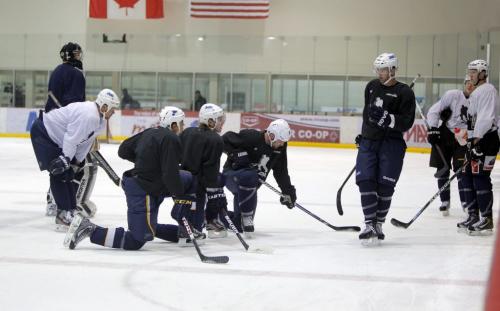 Locked out NHL players practice at the Iceplex in Winnipeg. Andrew Ladd in blue on right helps run the practice. December 6, 2012  BORIS MINKEVICH / WINNIPEG FREE PRESS