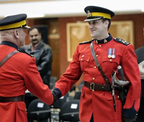 Assistant Commissioner Kevin Brosseau (right) shakes the hand of RCMP Commissioner Bob Paulson (left) after he is made the new commander of RCMP "D" Division during a change of command ceremony at the Minto Armouries. He replaces Assistant Commissioner Bill Robinson who now resides in Edmonton, Alberta.  121206 December 06, 2012 Mike Deal / Winnipeg Free Press