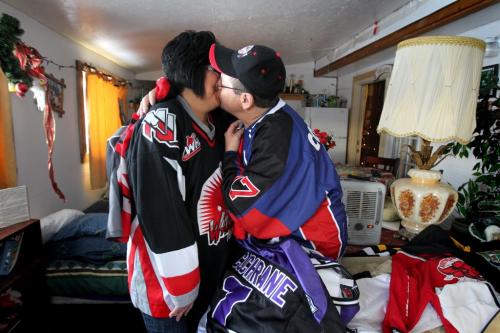 Farron Cochrane and his wife Pearl laugh, giggle and kiss as they look through all their son Ralph's hockey jerseys in their home on Peguis First Nation. See Randy Turner's Native, Aboriginal hockey story. Dec 05, 2012, Ruth Bonneville  (Ruth Bonneville /  Winnipeg Free Press)
