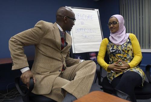 Serge Kaptegaine, program manager of the Refugee Employment Development Program  does a mock interview with Ethiopian student Kemer Ali at the Opportunities for Employment office in downtown Winnipeg   - See Katherine Dow United Way Feature- December 07, 2012 (JOE BRYKSA / WINNIPEG FREE PRESS)