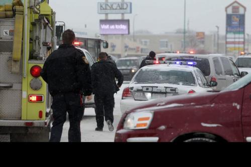 Emergency personal vehicles line up just on Ellice Ave. just east of the St. James intersection after a MVC Saturday afternoon.  Some motorists were seen being taken away in an ambulance. Standup weather photo. Dec 08, 2012, Ruth Bonneville  (Ruth Bonneville /  Winnipeg Free Press)