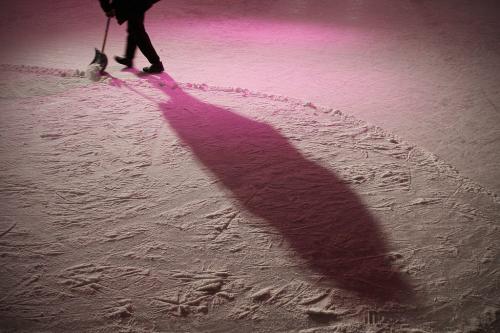 Ray (did not want last name used) clears the ice for skaters at the Forks Saturday, December 8, 2012. (John Woods/Winnipeg Free Press)