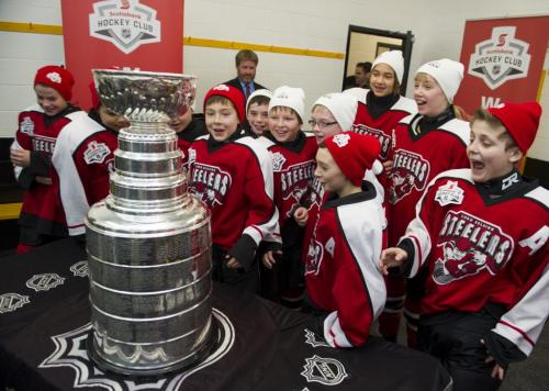 Players from The Lord Selkirk Steelers minor hockey team received the surprise of a lifetime when the Stanley Cup made a visit to their dressing room before practice at the East Selkirk Recreation Center Sunday December 9, 2012. The Steelers were randomly selected to receive the surprise as part of the Scotiabank Community Hockey Sponsorship Program. (DAVID LIPNOWSKI / WINNIPEG FREE PRESS)