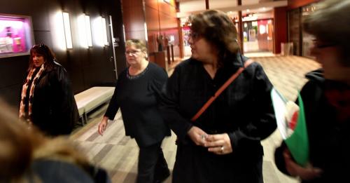 Debbie DeGale, (2nd from left) walks out of the Sinclair hearing Monday evening after stating her reports were changed by her superiors, sorry for the image quality, the women surrounding her prevented any further images....See Carol Sanders story. December 10, 2012 - (Phil Hossack / Winnipeg Free Press) Phoenix Sinclair