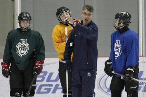 Winnipeg Jets coach Claude Noel coaches a minor league hockey camp at MTS Iceplex Monday, December 10, 2012. (John Woods/Winnipeg Free Press)
