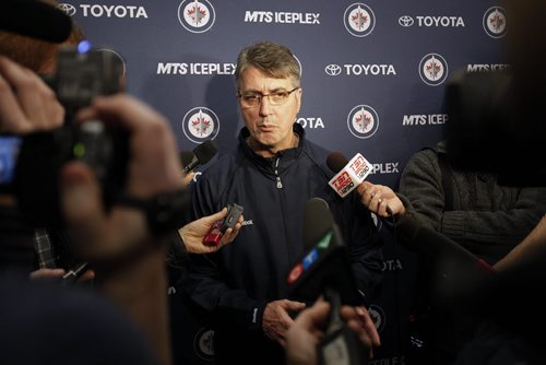 Winnipeg Jets coach Claude Noel speaks to media prior to coaching a minor league hockey camp at MTS Iceplex Monday, December 10, 2012. (John Woods/Winnipeg Free Press)