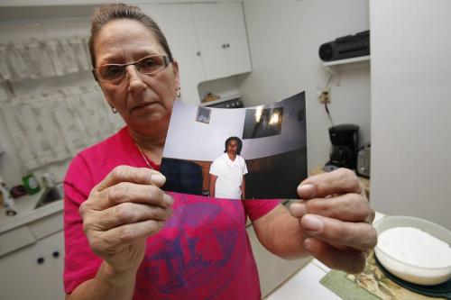 In her Selkirk home Tuesday, December 11, 2012 Sandra Hohne holds a photograph of her sister Gloria Sanderson who died in a fire Monday, December 10 in Selkirk. (John Woods/Winnipeg Free Press)