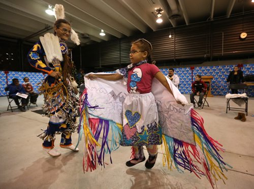 Sherry Starr and her daughter, Callie Starr, 6, participate in a Kids Pow Wow Club, at the Ma Mawi Wi Chi Itata Centre, Wednesday, December 12, 2012. (TREVOR HAGAN/WINNIPEG FREE PRESS) - december 29 fyi