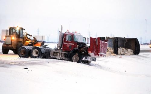 Truck vs. Gravel semi. Big accident scene on north perimeter highway at Sturgeon Road. PLEASE HAVE THE DESK CHECK FOR DETAILS. December 13, 2012  BORIS MINKEVICH / WINNIPEG FREE PRESS