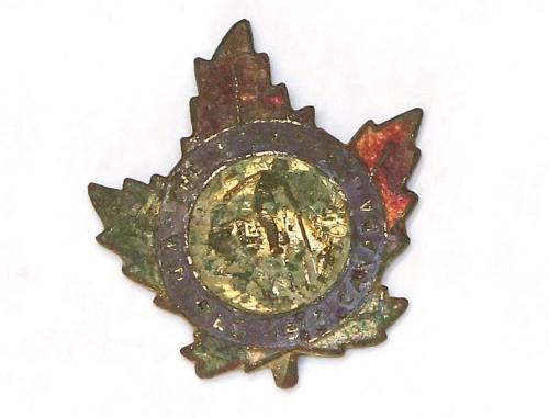 Malcolm Taylor's 1913 Winnipeg Rodeo pin that was sent to him from an old Navy buddy who found it while digging around in Nottinghamshire, England, Friday, December 14, 2012. (TREVOR HAGAN/WINNIPEG FREE PRESS)