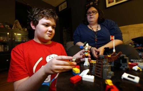 Gavin Walberg, 11, and his mom, Charlene. Gavin has Asperger's Syndrome, Friday, December 14, 2012. (TREVOR HAGAN/WINNIPEG FREE PRESS)