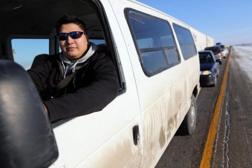Fabien Peters waits in traffic on the Trans-Canada Highway near Rd 42 West as members of Sandy Bay First Nation blockaded Highway #1 to protest budget bill C45, Saturday, December 15, 2012. (TREVOR HAGAN/WINNIPEG FREE PRESS)