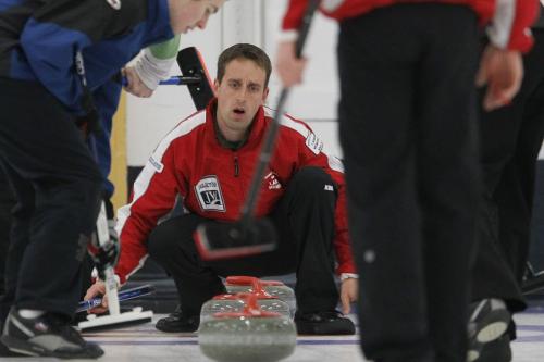 Dennis Bohn curls in the provincial curling playdowns at Charleswood Curling Club Sunday, December 16, 2012. (John Woods/Winnipeg Free Press)