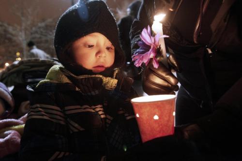 December 17, 2012 - 121217  -  On Monday December 17, 2012 at the University of Winnipeg at a vigil for six year old Ana Grace Marguez-Greene who was killed in Newtown, CT Friday, December 14 young Lucas Gamez lights his candle. Ana mother taught at the University of Winnipeg and her father taught at the University of Manitoba before moving to Newtown this past July John Woods / Winnipeg Free Press