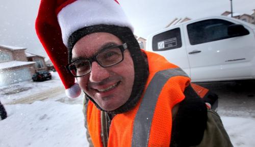 Manny Borges, landscaper with Class A Service - who does snow removal from homes and businesses, says he sometimes gets tips from clients around Christmas or when there's an exceptional job done. The Bank of Montreal says snow landscapers should get tips of a gift worth up to $20, or the same as one day's pay. December 18, 2012 - (Phil Hossack / Winnipeg Free Press)