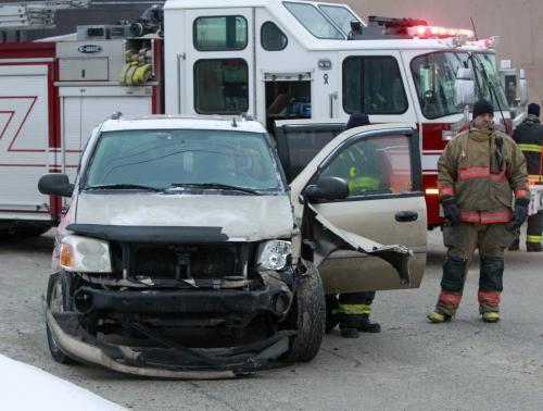 A multi-vehicle collision on Main St. at Machray Ave. sent two people to the hospital and slowed south bound traffic during the Wednesday morning commute. (WAYNE GLOWACKI/WINNIPEG FREE PRESS) Winnipeg Free Press  Dec.19   2012