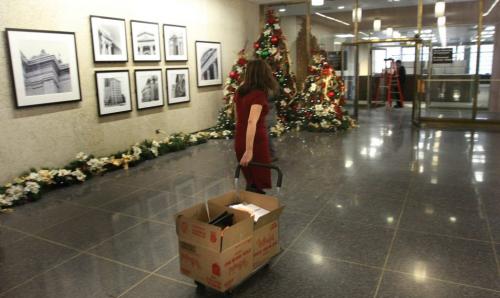 City Clerk Josie Marques moves boxes into the offices on the main floor of the Winnipeg City Hall's Administration Building that are being prepared for the move of the City Clerk's Dept.  For Bart Kives story (WAYNE GLOWACKI/WINNIPEG FREE PRESS) Winnipeg Free Press  Dec.19   2012