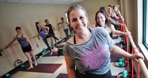 Heather Senderewich, manager of Moksha Yoga on Waverley during her fitness class that mixes yoga with ballet, using a ballet barre.  121220 December 20, 2012 Mike Deal / Winnipeg Free Press
