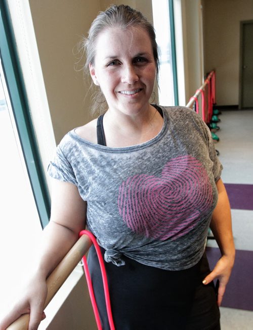 Heather Senderewich, manager of Moksha Yoga on Waverley during her fitness class that mixes yoga with ballet, using a ballet barre.  121220 December 20, 2012 Mike Deal / Winnipeg Free Press