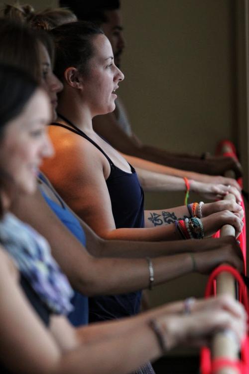 Ashley Bourgeois looks out the window while stretching during her fitness class that mixes yoga with ballet, using a ballet barre at Moksha Yoga on Waverley. 121220 December 20, 2012 Mike Deal / Winnipeg Free Press