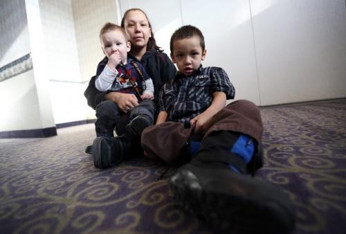 Crystal Bruyere, middle, plays with her sons, Jabian Bruyere, 17 mo, and Jaxon McLean, 3, at a supper provided by the province, for families of missing and murdered women at the Clarion Hotel, Saturday, December 22, 2012. Crystal's cousin, Fonessa Bruyere, was murdered in 2007. (TREVOR HAGAN/WINNIPEG FREE PRESS)