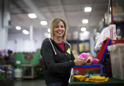 Lori Plett from Manitoba packs Christmas boxes for the Samaritan's Purse operation during the Christmas season in Calgary, Alberta, December 3, 2012. Operation Christmas Child was started in 1990. In 1993, Operation Christmas Child grew and was adopted by Samaritan's Purse, a Christian organization run by Franklin Graham. To date, Operation Christmas Child has collected and distributed over 94 million shoe box gifts worldwide.  Each shoe box gift is filled with hygiene items, school supplies, toys, and candy, is given to children regardless of gender, race, religion, or age. Photograph by Todd Korol for The Winnipeg Free Press