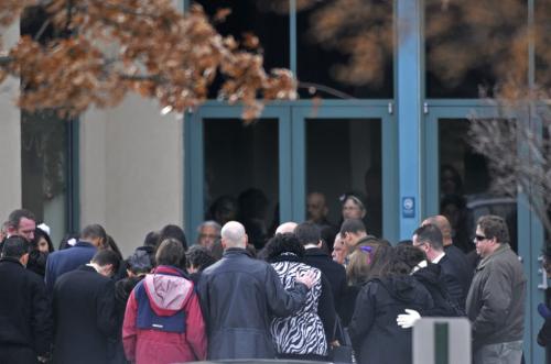 Bloomfield, CT - 10/22/12 - Mourners gather in a circle of prayer around Ana Grace Marquez-Greene's casket before entering The First Cathedral in Bloomfield Saturday for the wake and service to follow.  Brad Horrigan / Hartford Courant