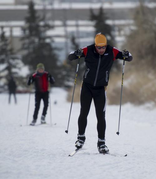 122312 Winnipeg - Alex Druw¾© climbs a hill at Westview Park with Red River Nordic teammates Sunday morning. DAVID LIPNOWSKI / WINNIPEG FREE PRESS