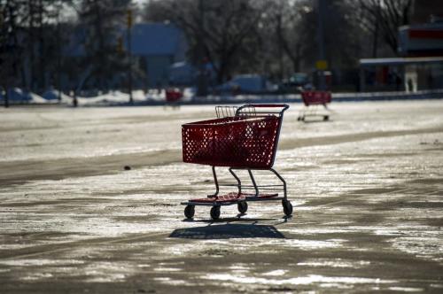 122512 Winnipeg -  The Polo Park Shopping Centre parking lot on Christmas day was empty aside from some irresponsibly left shopping carts. Today's empty parking lot will be in stark contrast to the mayhem that will ensue in finding a parking spot at the mall tomorrow on Boxing Day. DAVID LIPNOWSKI / WINNIPEG FREE PRESS
