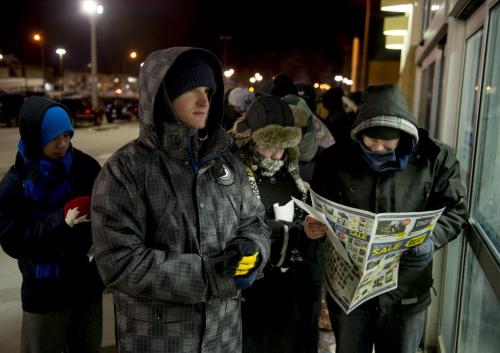 122612 Winnipeg -  Derek Kufley (21) was first in line at BestBuy, and has been waiting since 6:30pm Tuesday evening of Christmas day to buy a Nikon DSLR digital camera. The first customers through the door for Boxing Day deals at 6AM at the St. James Best Buy.  DAVID LIPNOWSKI / WINNIPEG FREE PRESS