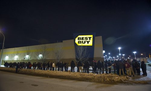 122612 Winnipeg -  The line for  Boxing Day deals snaked around the corner and down Silver Avenue at 6AM at the St. James Best Buy.  DAVID LIPNOWSKI / WINNIPEG FREE PRESS